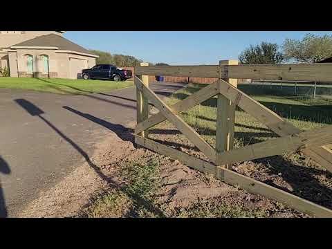 Ranch style fence with X shapes sections