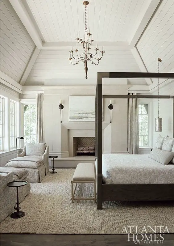 luxury master bedroom with separate sitting area