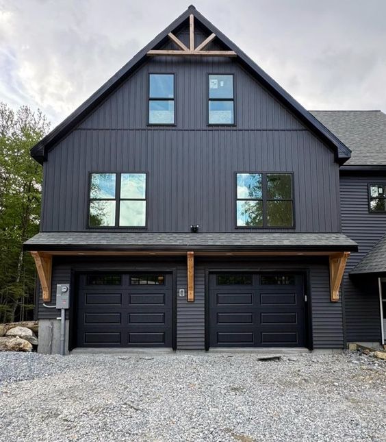 black garage doors with windows