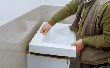 how to cut holes in vanity for floor plumbing