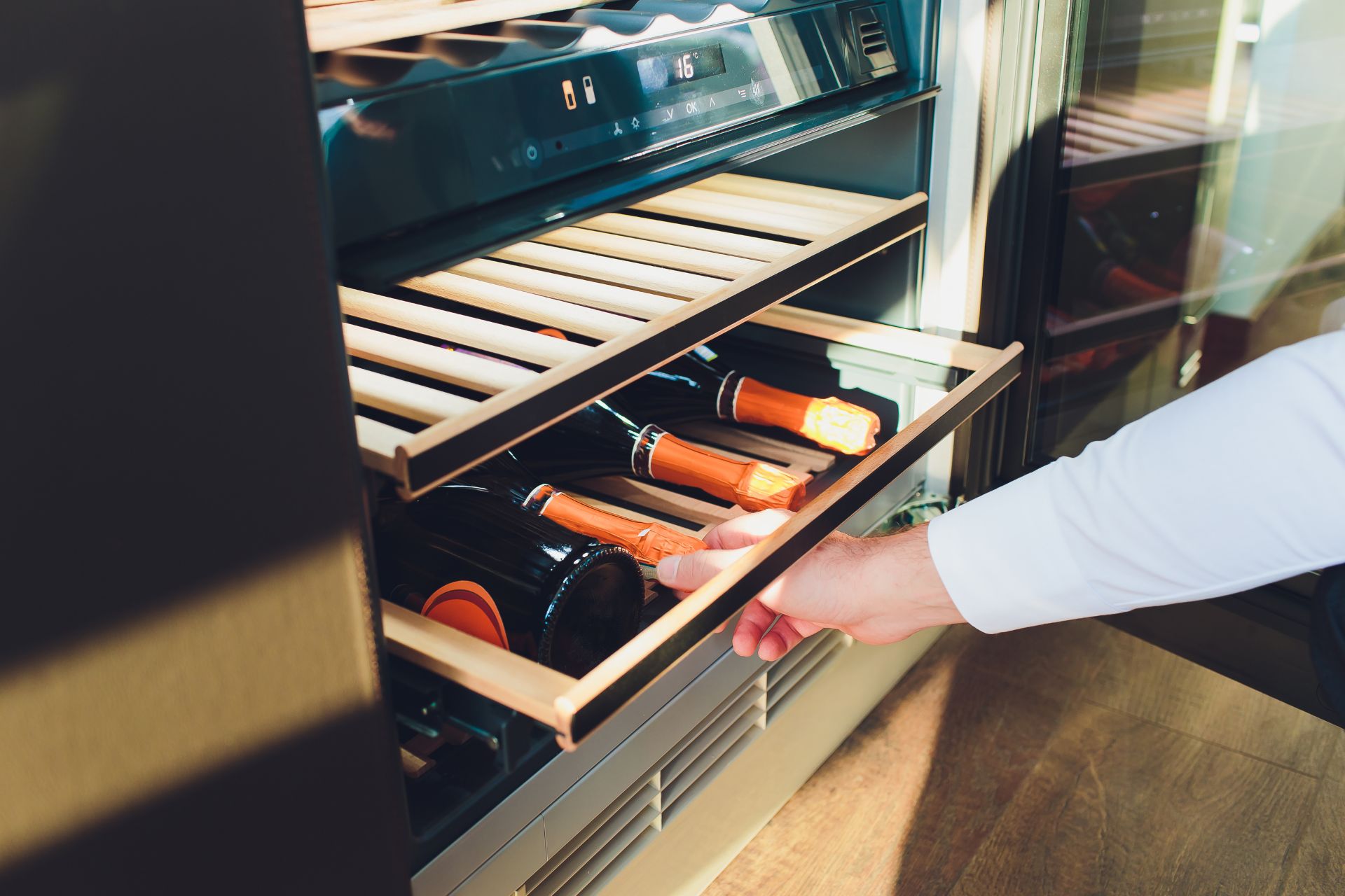 Under cabinet wine fridge in kitchen