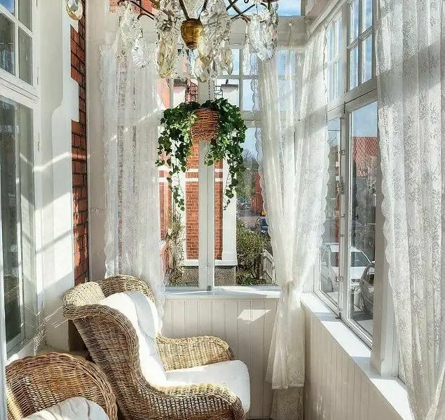 beautiful sunroom with curtains