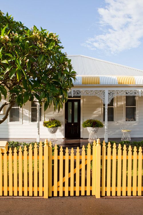 yellow painted fence