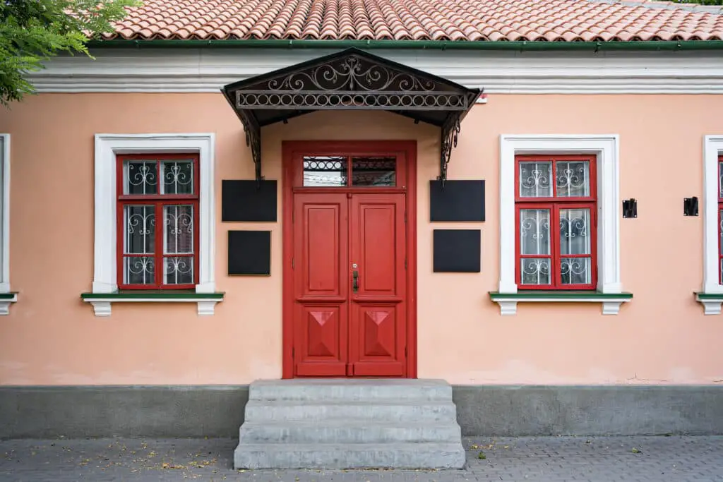 average cost to paint a door Vintage architecture classical facade building with red door
